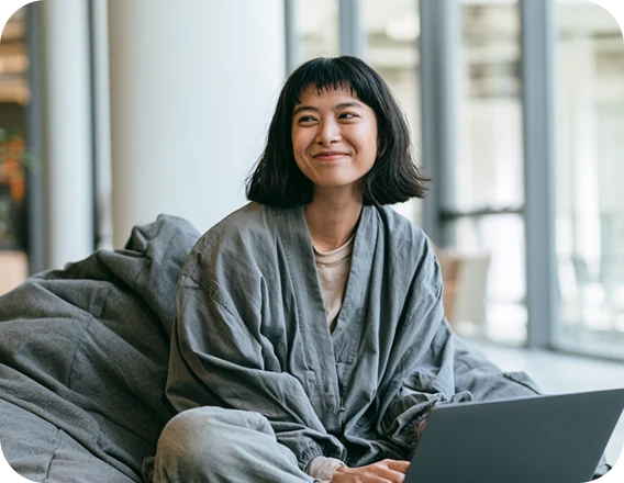 Smiling woman in a grey jacket