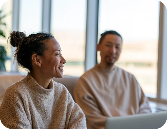 Two colleagues in a bright meeting room